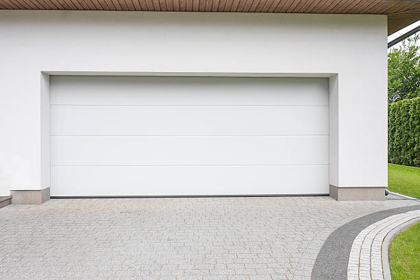 istock Modern garage elevation. Designer driveway garage with house Modern design. Luxurious exterior appearance. 2214363933
