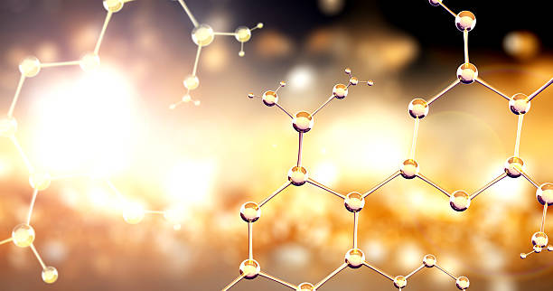 Vertical or horizontal banner with model of abstract molecular structure. Background is a combination of yellow and dark brown hues with a luminous glow and glass atom model. Copy space. 3d render