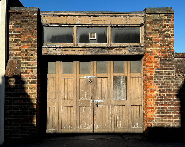 Old wooden garage doors on a building in Salisbury, Wiltshire
