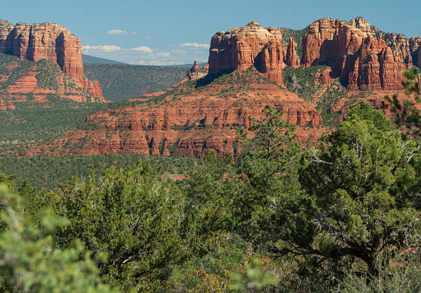 Sedona Arizona, surrounded by beautiful red rock mountains, canyons and spires. Located in the Southwestern United states and North of Phoenix, Sedona is a vacation and recreation resort Paradise.
