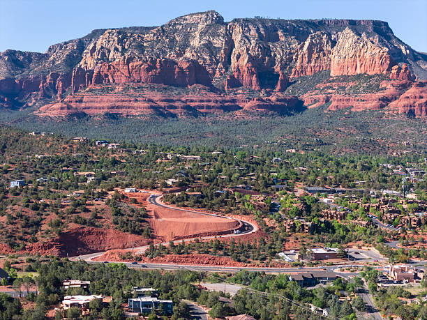 Sedona Arizona, surrounded by beautiful red rock mountains, canyons and spires. Located in the Southwestern United states and North of Phoenix, Sedona is a vacation and recreation resort Paradise.