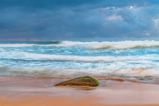 Moody sunrise seascape at Killcare Beach on the Central Coast of NSW, Australia.