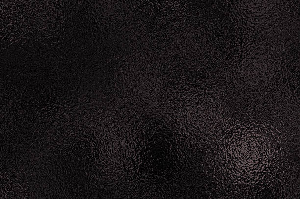 istock Dark foil glass texture background. Abstract gradient bright light reflection and shiny rough texture surface. Glass effect background 2214430765