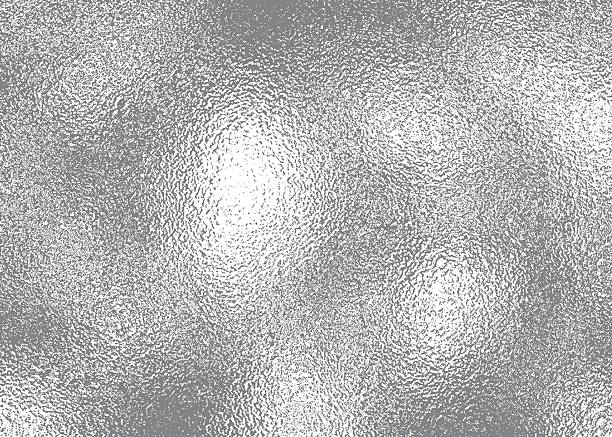 istock Silver gray foil texture glass effect background, gray platinum metallic texture. Silver gradient background. Foil paper, glitter effect. Chrome metal gray pattern. Gradation noise texture 2214431337