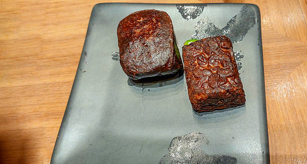 istock Photograph: Tempeh and tofu were prepared using the Javanese 'bacem' cooking method, commonly known as Tempe Tahu Bacem, and served on a gray plate. 2214433249