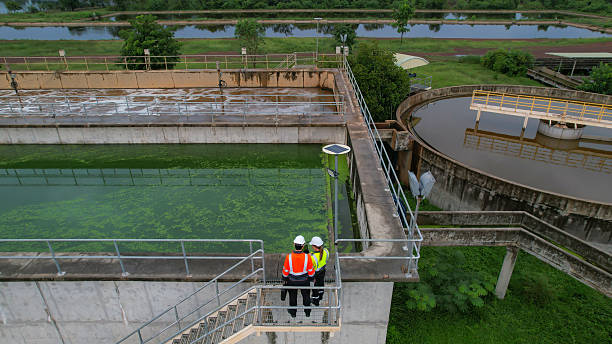 istock Top view Two environment engineers working on a Wastewater treatment system or a Sewage treatment process, Industrial and environmental 2214437865