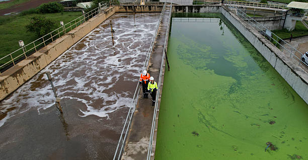 istock Top view Two environment engineers working on a Wastewater treatment system or a Sewage treatment process, Industrial and environmental 2214437881