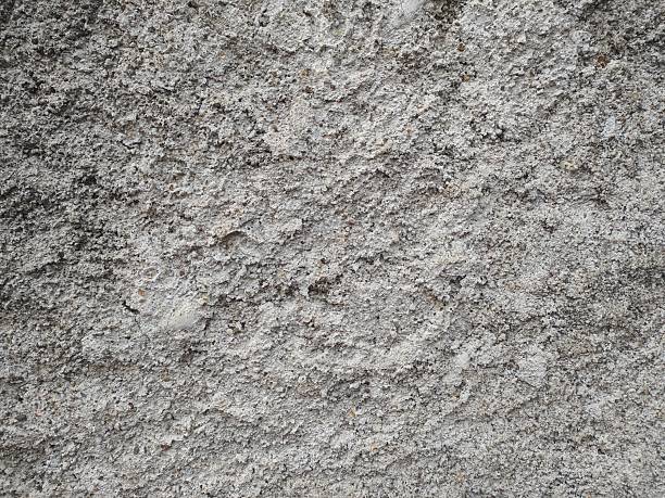 istock Close-up View of Weathered Gray Concrete Texture 2214442585