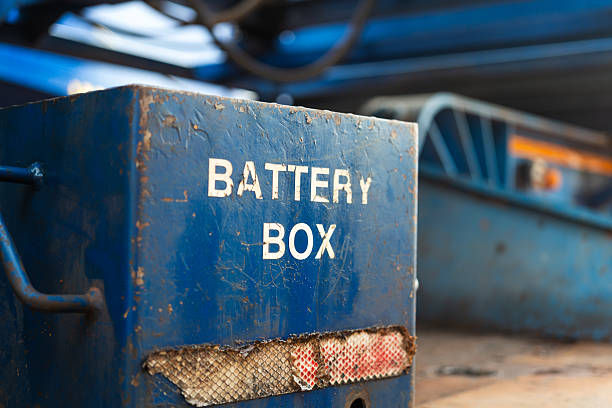 A battery box with English text, electricity power supply for the machine. Industrial equipment object, close-up.