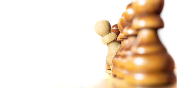 Capture of a chess piece during a strategic game in a quiet setting showcasing thoughtful competition