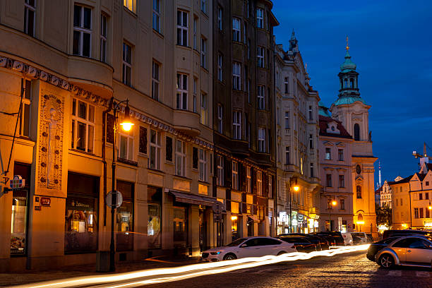 Old town at night with motion blur traffic, Prague