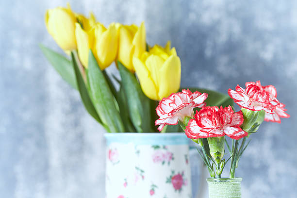 Bouquet of carnation and rose isolated on a white background.