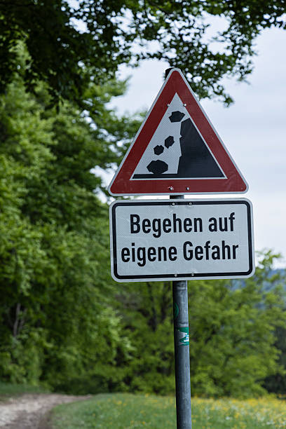 istock sign warns of rockfall 2214459279