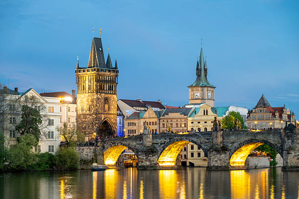 istock View across river to old town and bridge at dusk, Prague 2214461546