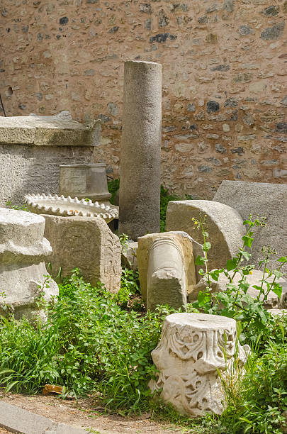 istock Ancient stone ruins with overgrown vegetation in a historical outdoor setting 2214461554