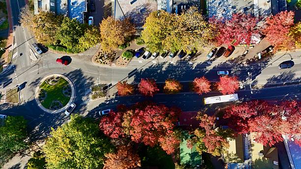 istock Stirling Roundabouts, Adelaide Hills, South Australia – Aerial Drone View Featuring Leafy Roundabouts, Autumn-Colored Trees, Surrounding Streets, Vehicles, and the Town’s Natural Beauty 2214463290