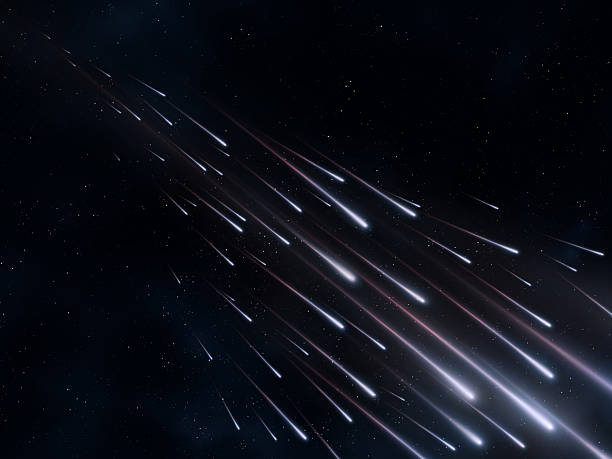 istock Flashes of bright meteorites. Star rain on a black background. 2214468566