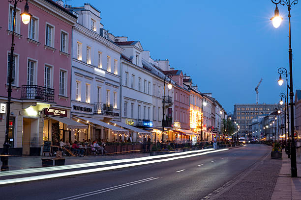 istock Old town at dusk with motion blur traffic, Warsaw 2214468988