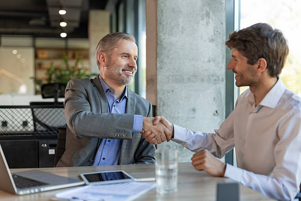 istock Businessmen shaking hands during a meeting. 2214473005