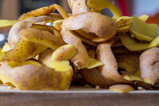 potato peelings or skins textured background - cheap and nutritious crisis meal