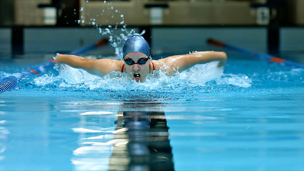 istock Swimmer in pool, freestyle, training, indoor, water sport. 2214474884