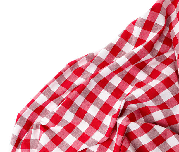 istock Crumpled checkered tablecloth isolated on white, top view 2214477606