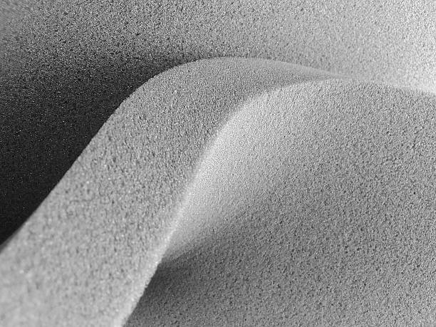thick gray sponge foam arch. elastic and flexible texture sheet with wavy edges. absorbent material