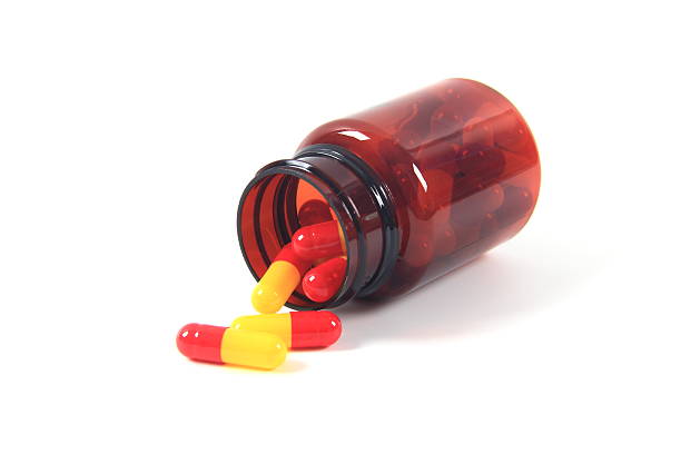 A bottle of medicine on white background