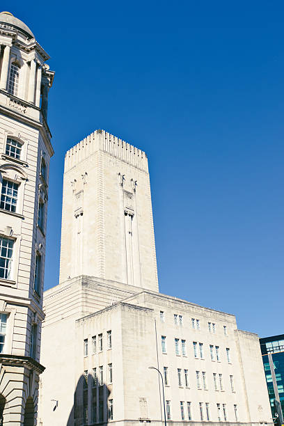 istock Two Buildings with Tower Against Clear Blue Sky in Liverpool, UK. 2214485486
