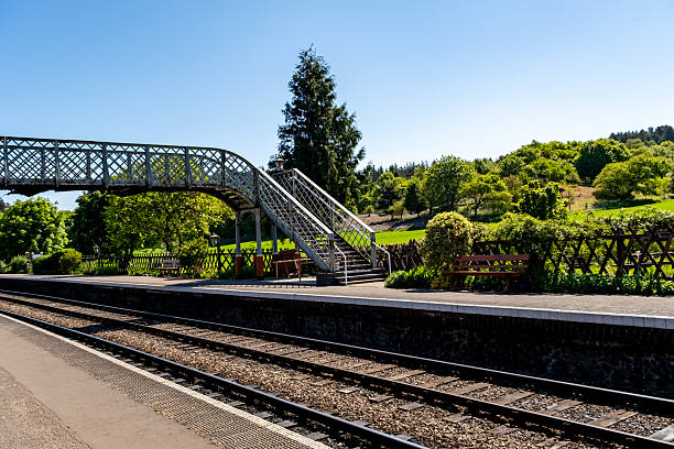 Weybourne, Norfolk, UK  May 10 2025. Metal footbridge at Weybourne station on the North Norfolk Railway Line Poppy Line