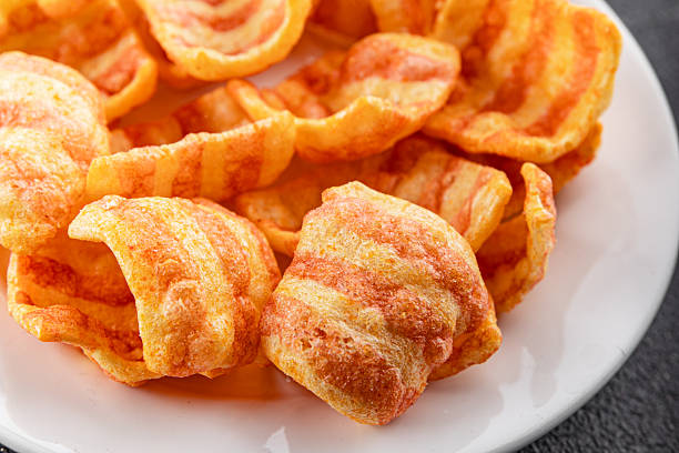 istock Chips bacon crispy rashers corn snacks fast food natural food fresh dish on the table rustic food top view copy space 2214497593