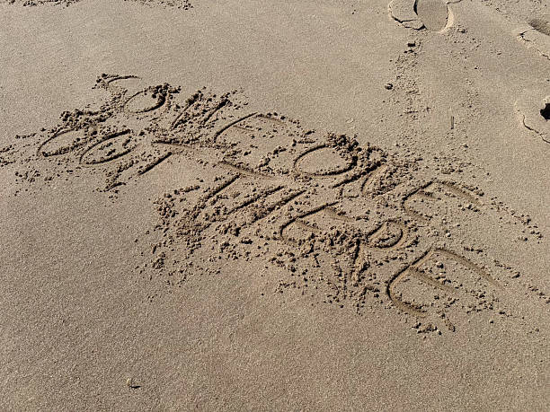 istock in a sand  strand the words someone out there are written 2214501221