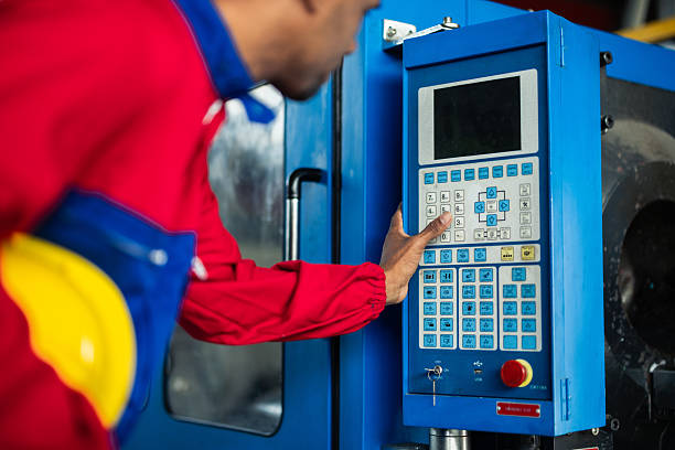 istock PVC production worker running industrial machines 2214502405