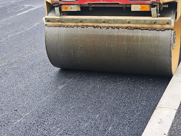 istock Roadworks, Road construction. Paving roller on roadworks at construction site, paving works. 2214502864
