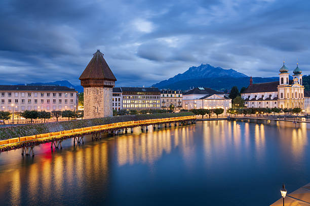 istock Lucerne, Switzerland with the Chapel Bridge at Twilight 2214515170