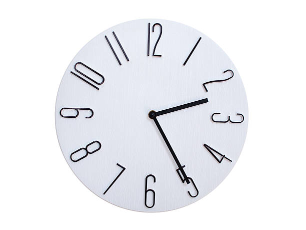 Minimalist Round Wall Clock Showing 02:25 or 14:25. Thin Black Numerals on White Wood Background.