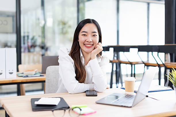 istock Asian businesswoman analysis data at desk in office working space. 2214521653
