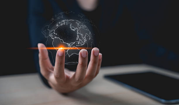 istock Big data analytics and business intelligence concept. Businessman holding Global network connection. World map point and line composition concept of global business. 2214530228