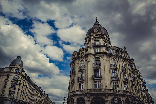 istock Urban landscape : ornate building featuring classic French urban architecture, with rounded corner tower and topped distinctive dome. 2214530848