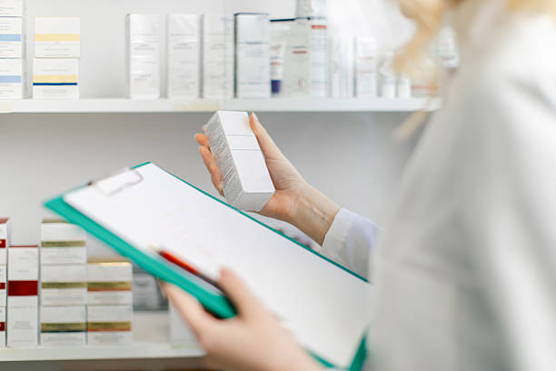 istock Young woman pharmacist at her workplace 2214533816