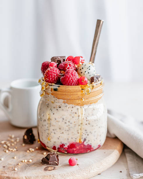 istock Vanilla oats served in a jar with fresh fruit and peanut butter 2214539493