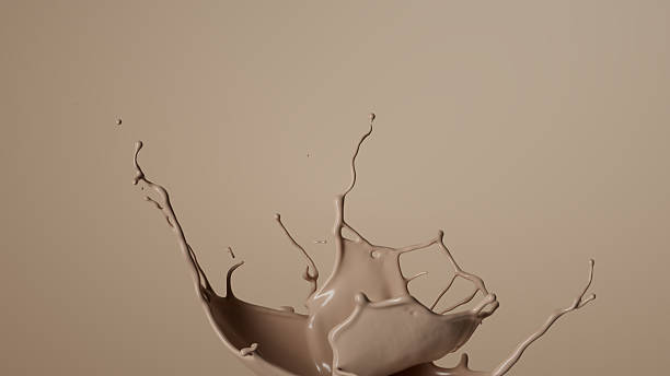 istock fluid jet, beige splashing coffee drink, droplets scattering in all directions. Abstract dynamic background. Drink or cosmetics concept. 3D rendering 2214562349