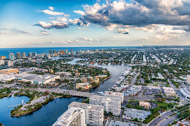 Hotels, condos and resorts lining the beach at Fort Lauderdale and Pompano Beach Florida shot via helicopter from an altitude of about 1000 feet.