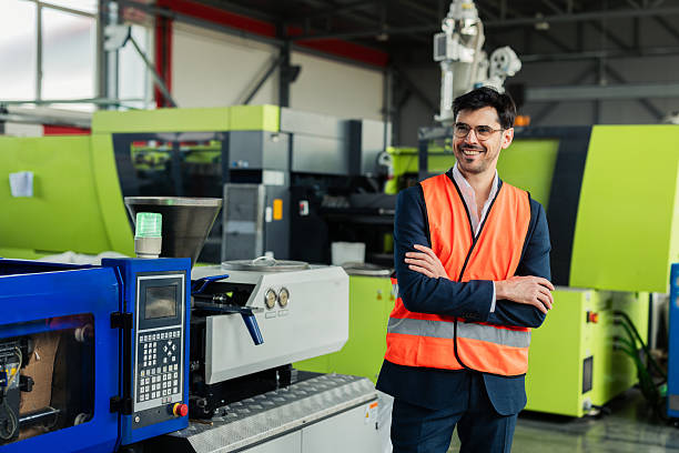 Portrait of a mid adult engineer at the PVC factory