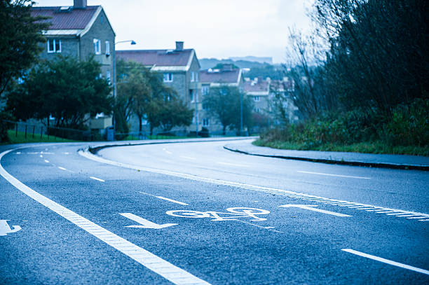 istock Curved road with bicycle lane.. 2214573551