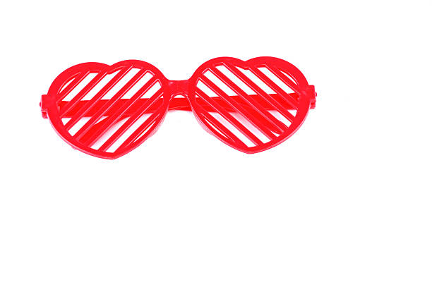 red plastic glasses with heart shape for Valentine’s Day party