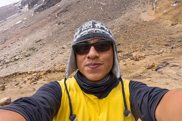 istock Hiker taking a selfie on iztaccihuatl volcano in mexico 2214576464