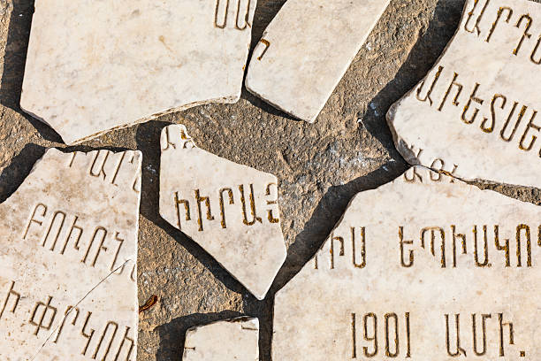 Western Asia, Eurasia, South Caucasus, Republic of Armenia. Sevan. Broken stone tablets outside of the church of Surp Arakelots at the Sevanavank Monastery complex on Lake Sevan.