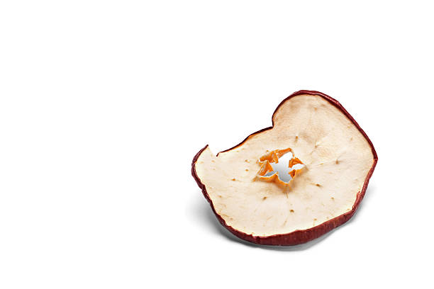 round dried apple chip isolated on white background