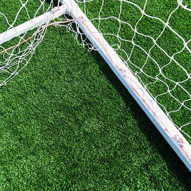 istock Soccer Goal Net on Green Turf 2214582849